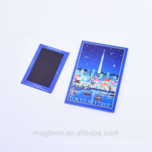 custom wholesale blue color tower design tin plate fridge magnets for super market